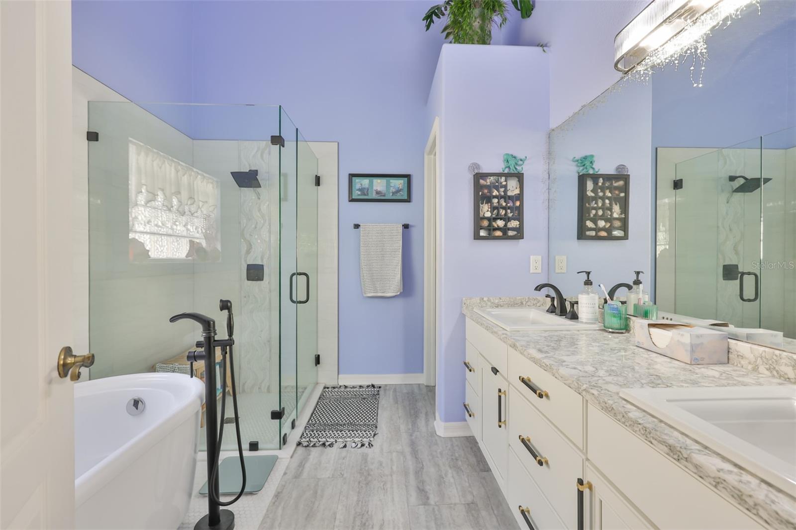 Remodeled Primary Bath w/Quartz counters and glass enclosed shower