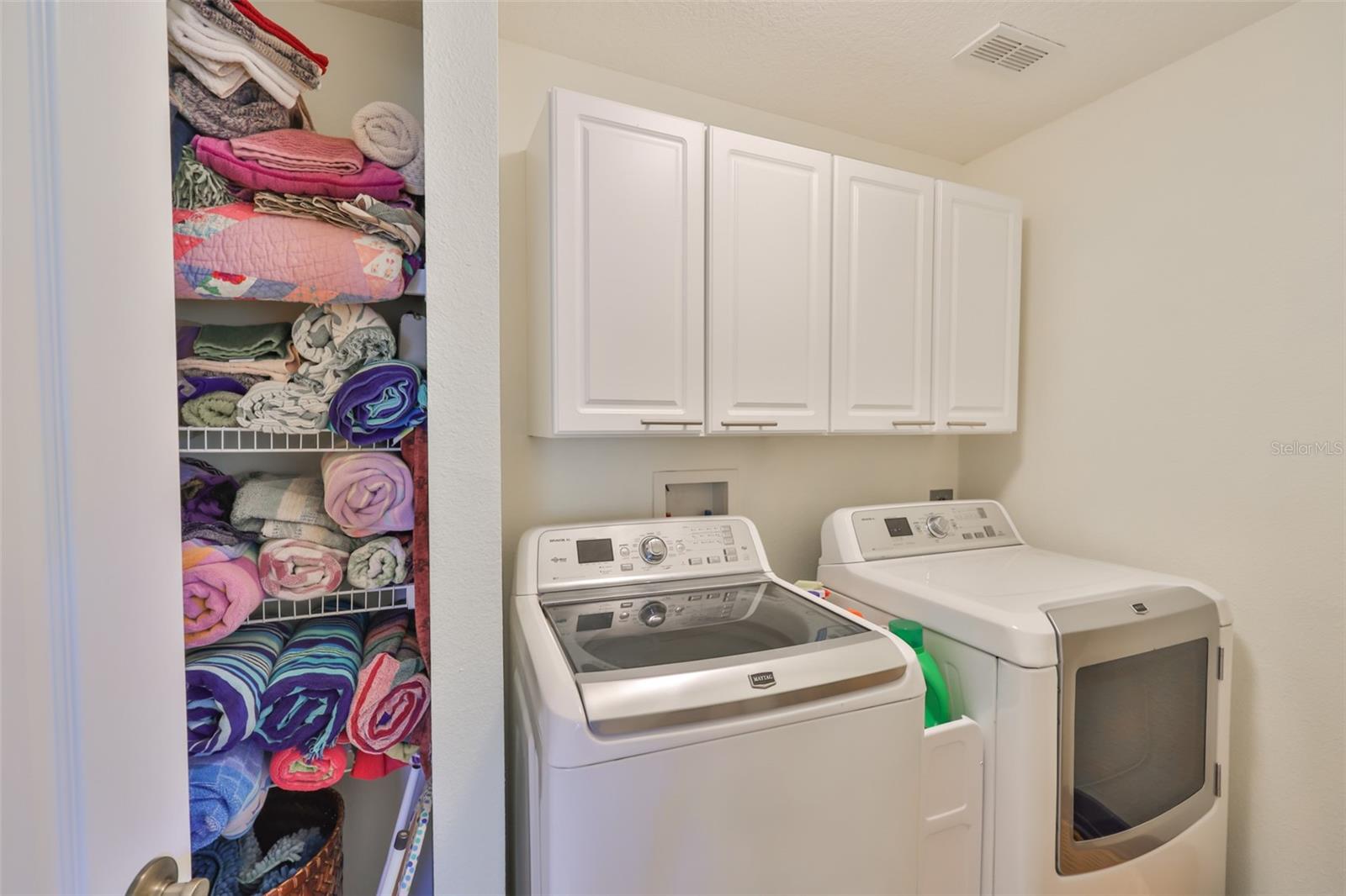 Linen closet for the pool towels, etc. Washer and dryer included!