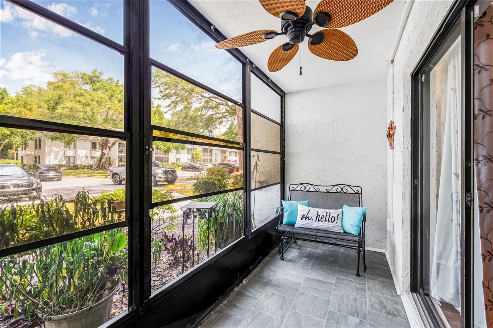 You can unwind and enjoy the serene surroundings on your screened-in lanai, which features a tiled floor and a ceiling fan for your comfort.