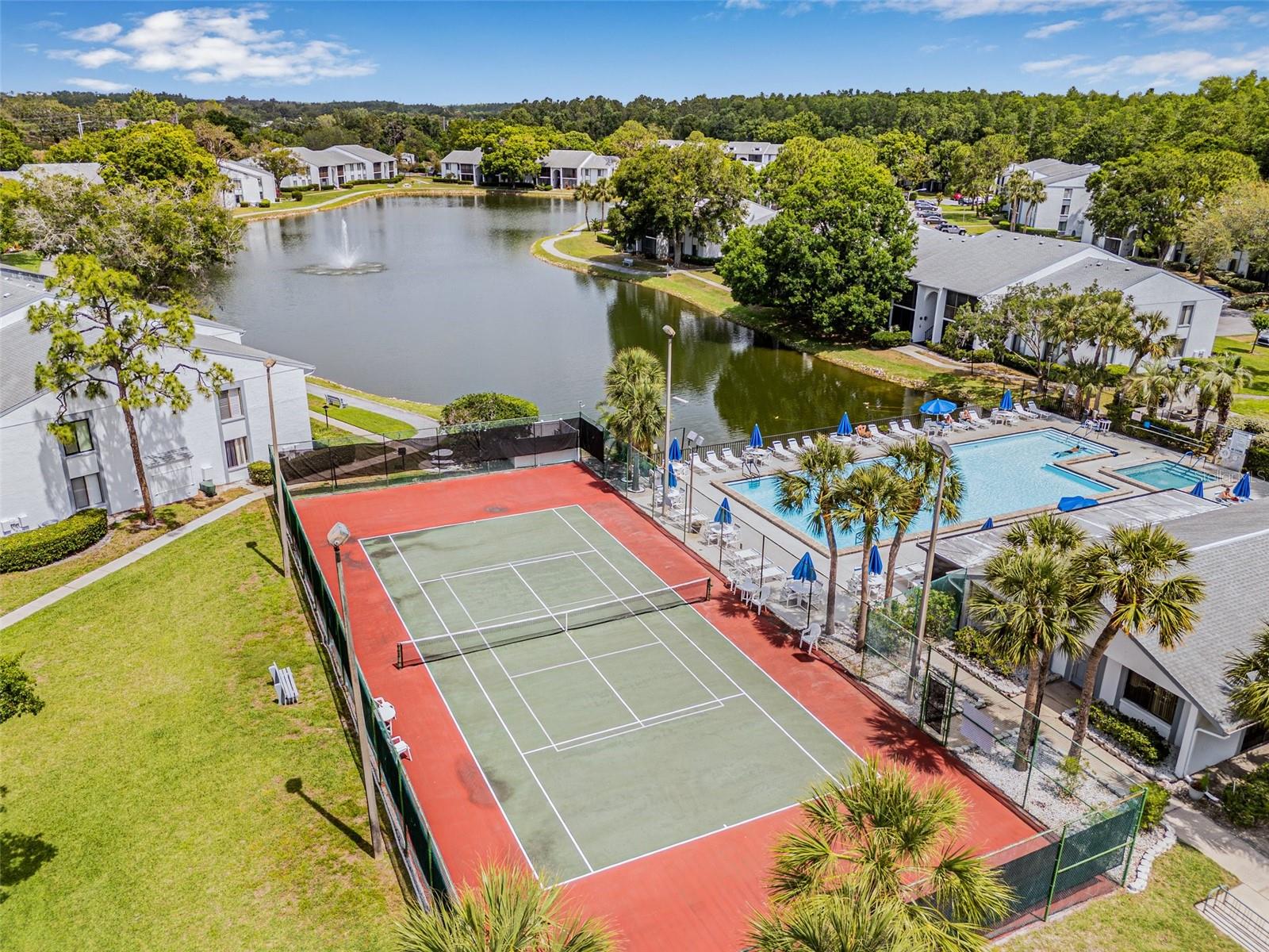 Just steps away from your home, you'll discover a wealth of fantastic community amenities, including a heated pool, spa/jacuzzi, tennis courts, shuffleboard, a playground, and a clubhouse available for rent for your special occasions.