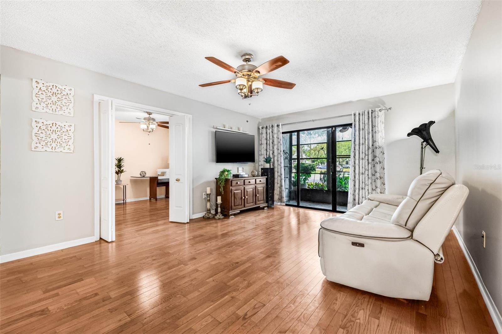 Living room area has an access to bedroom #3/office.