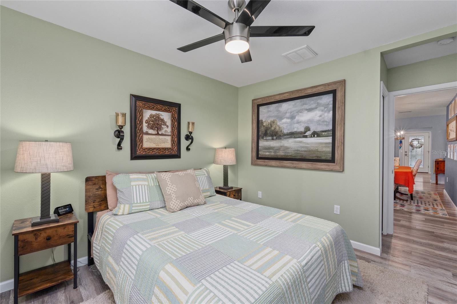 Bedroom 2 has a walk in closet and a ceiling fan to keep your guests cool and comfortable.