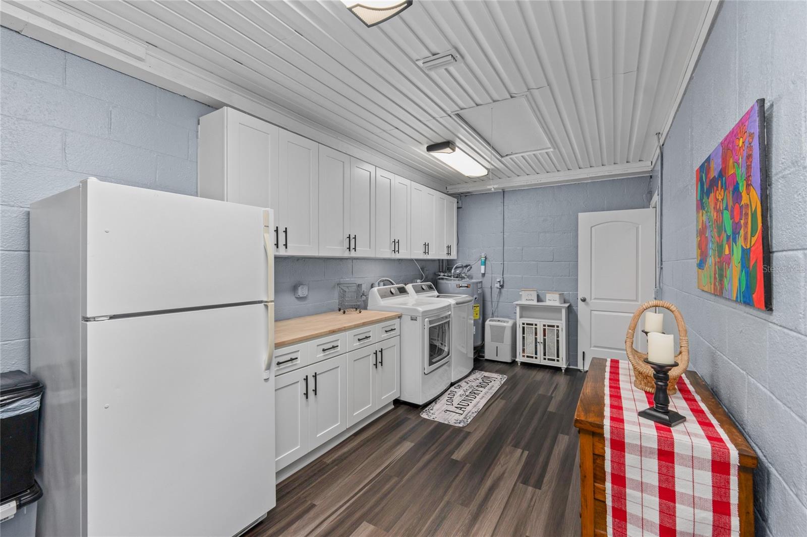Laundry Room with brand new flooring and more storage