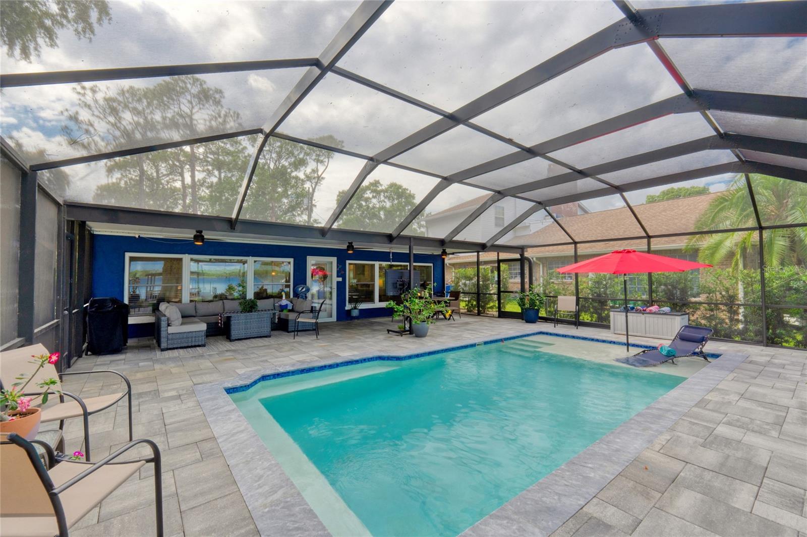 The HUGE covered Lanai has enough space for all of your friends and family