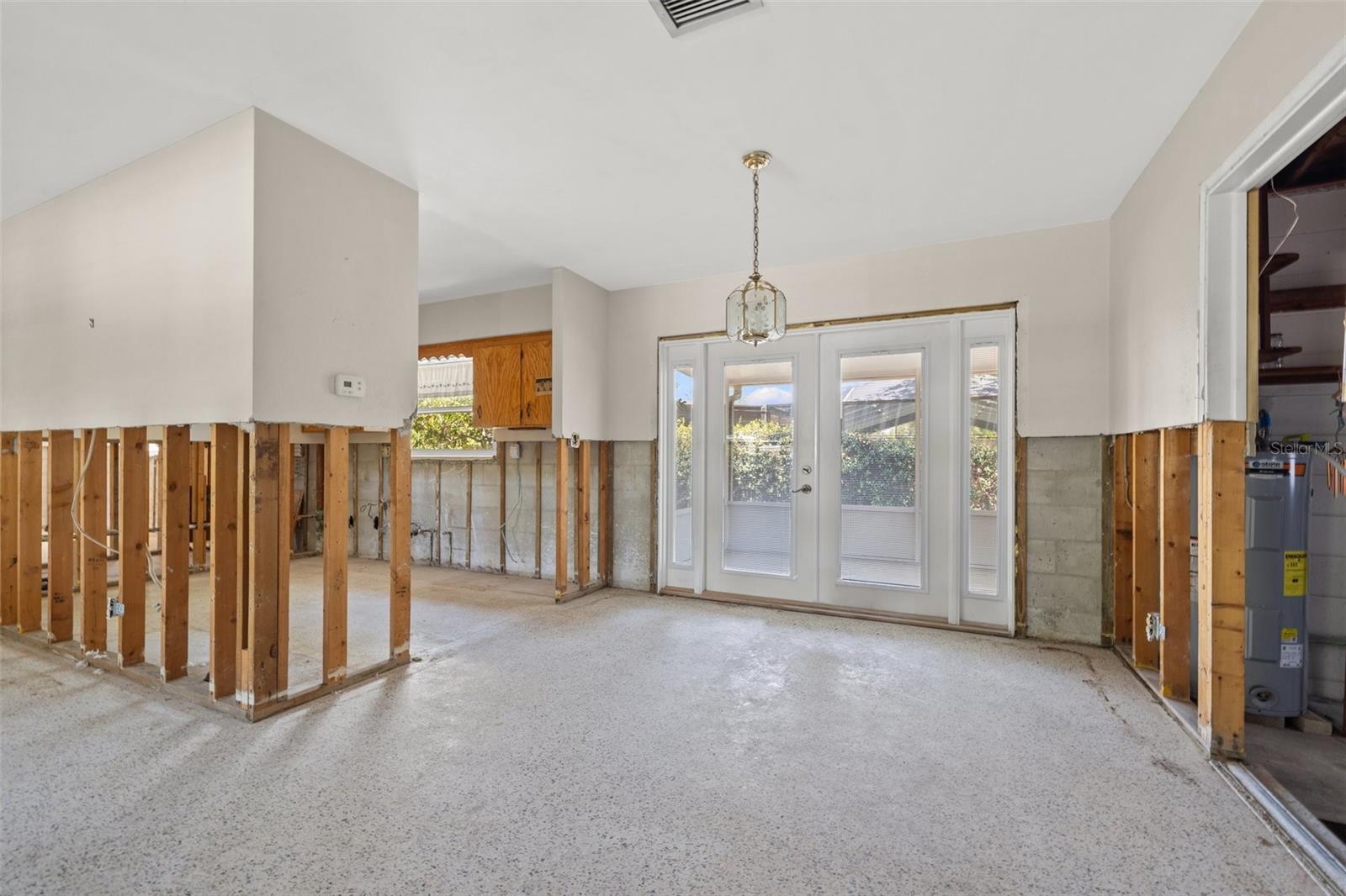 Remove the kitchen wall and create an open concept with an island
