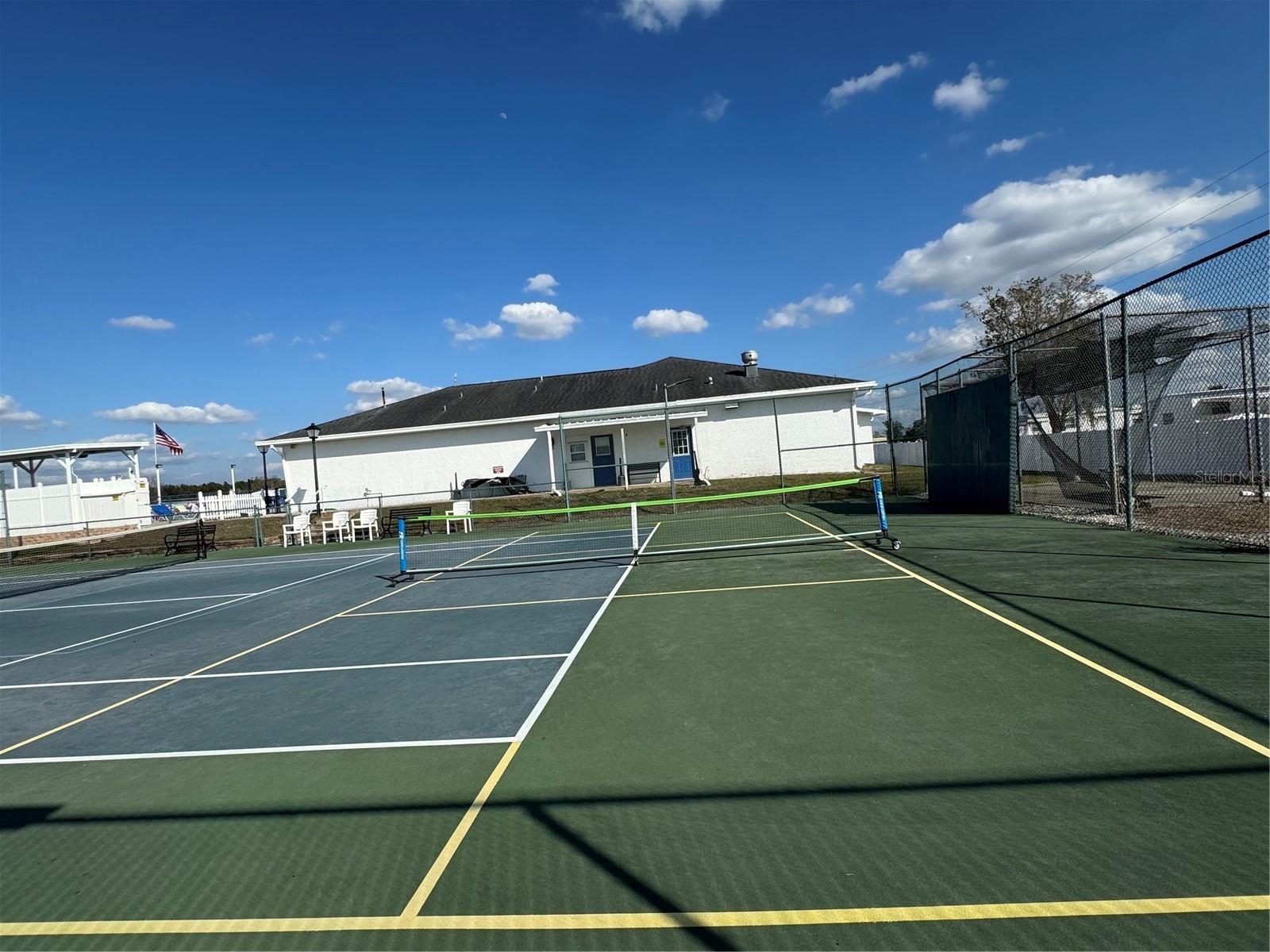 Pickleball Court 2 with clubhouse in background