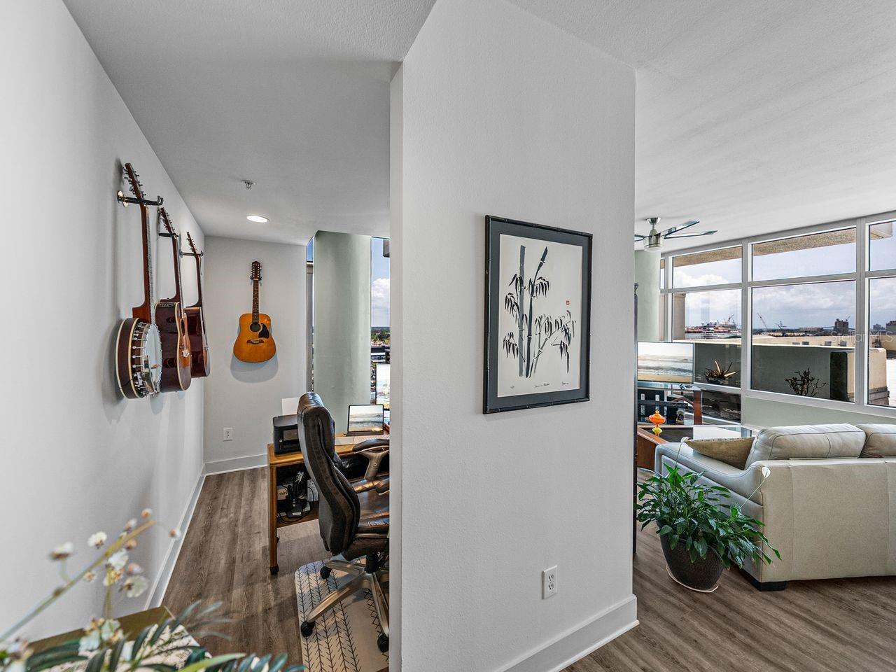 Private space behind the wall with hutch is a perfect flex space or can be used for a home office.