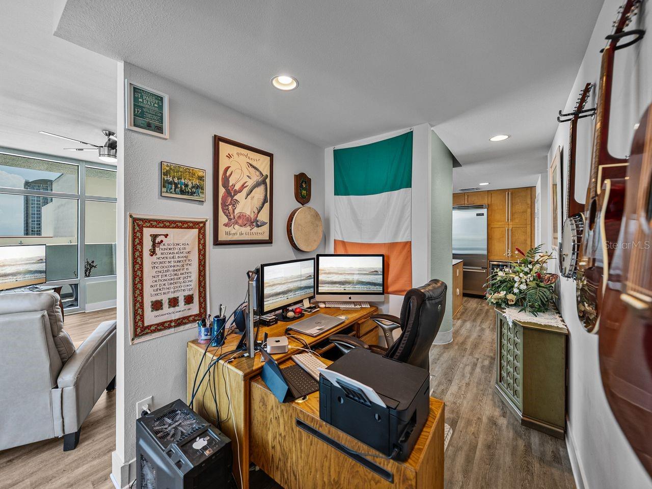Large flex space with lots of natural light make this space perfect for a home office.