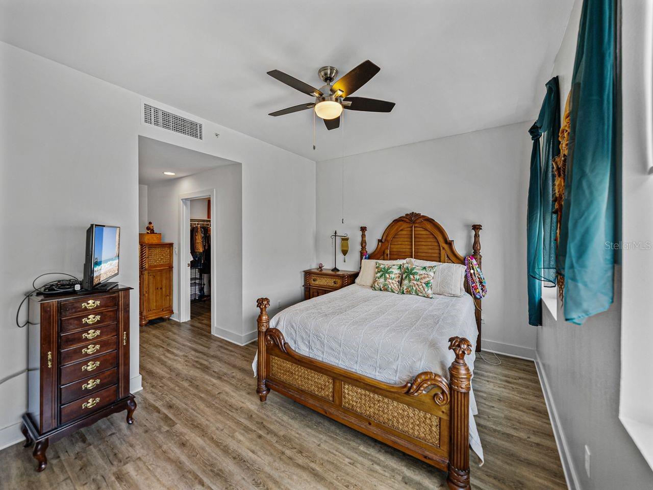 Walk-in closet located in the hallway entrance to the bedroom