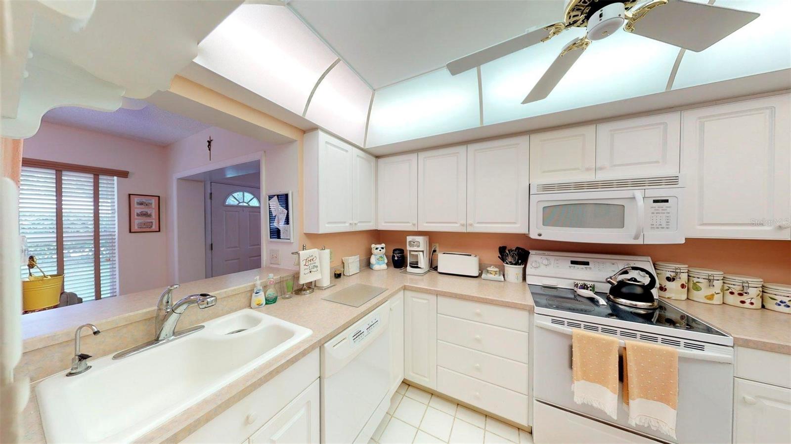 Cozy kitchen but not crowded and plenty of cabinet space