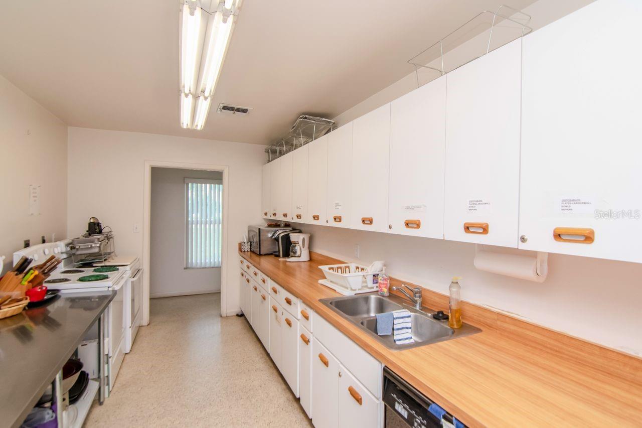 Clubhouse offers generous sized kitchen for hosting larger gatherings.