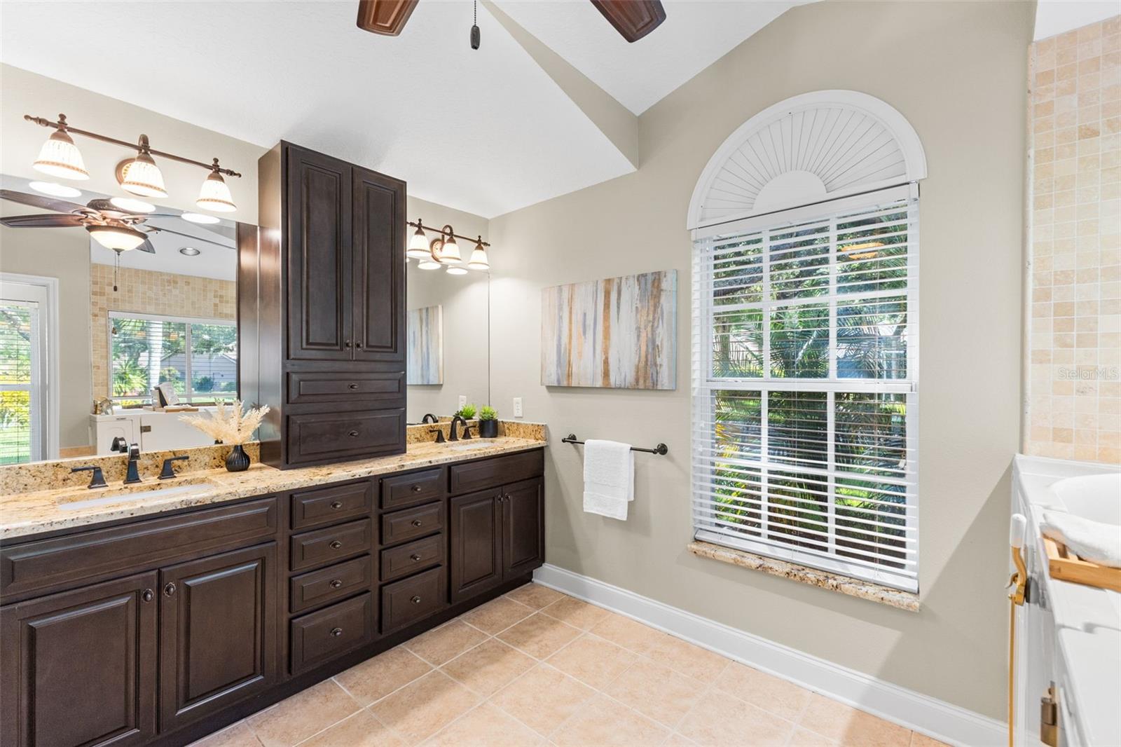 Dual Vanities with Granite Tops and Plenty of Storage