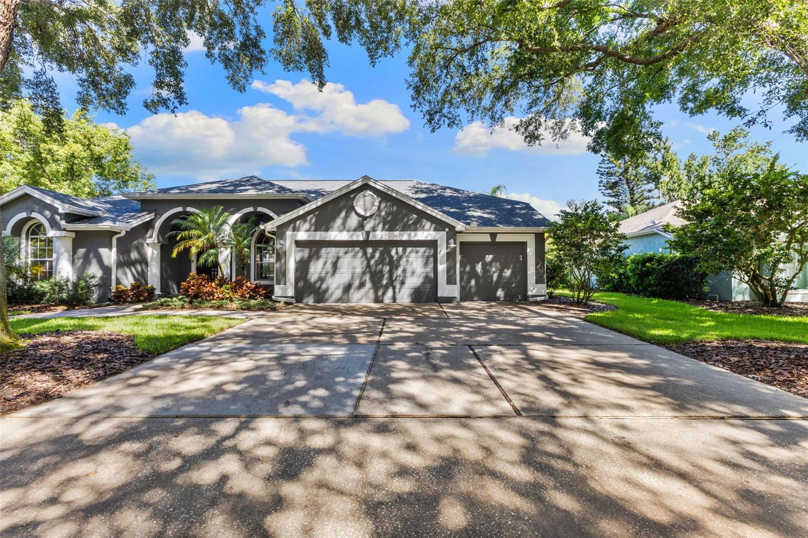 Front of Home with Beautiful Shade Trees