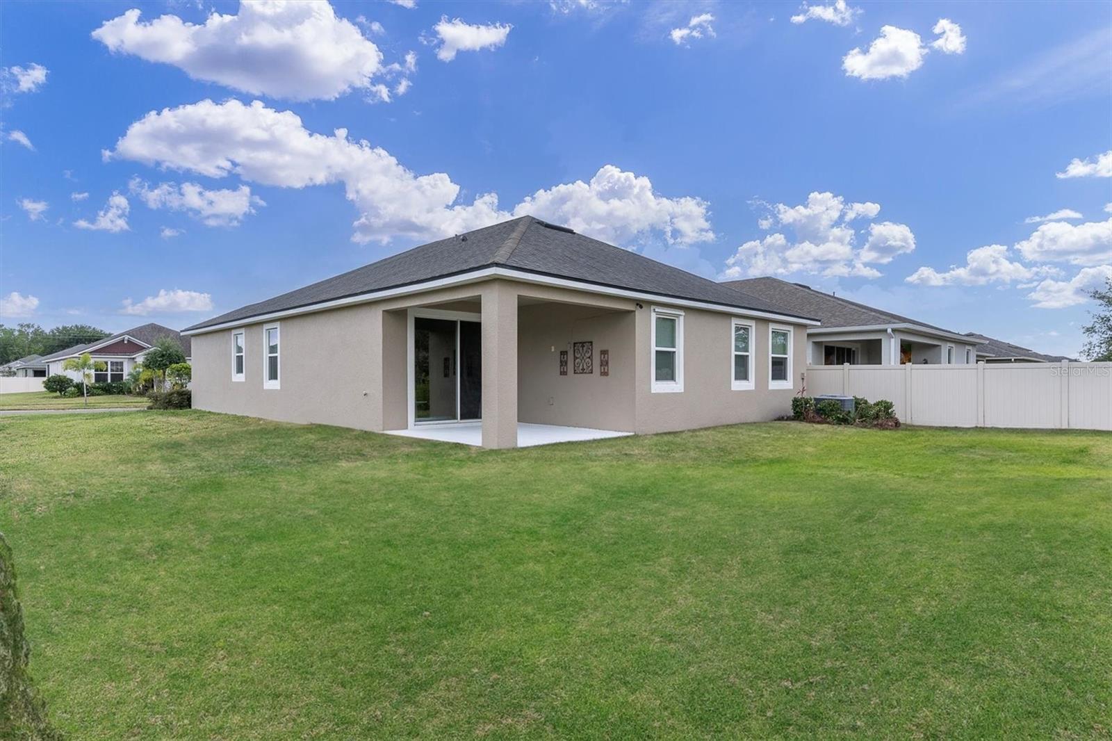 Corner Lot and Backyard with Covered Lanai