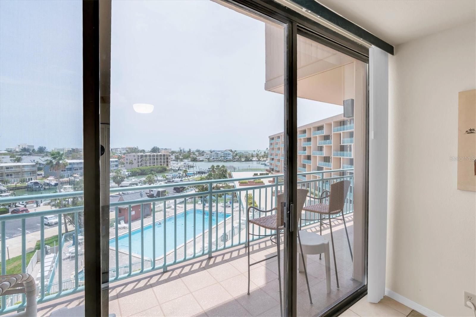 Living Room View - OPENS to Balcony - Southerly exposure w/views of Bay & Gulf in distance!
