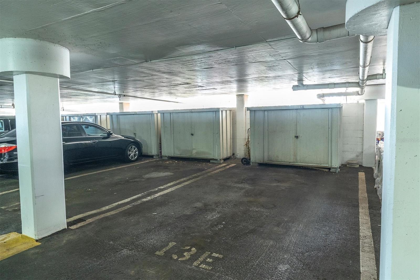 representative covered, assigned parking spot - WITH storage shed