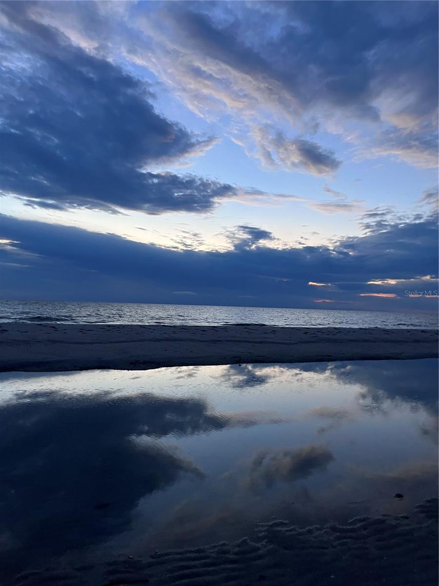 Walking on sand in the evening.