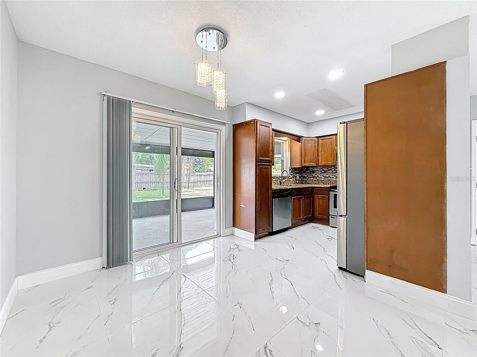Dining Room - Kitchen - Sliding Doors to Outdoor Living Space