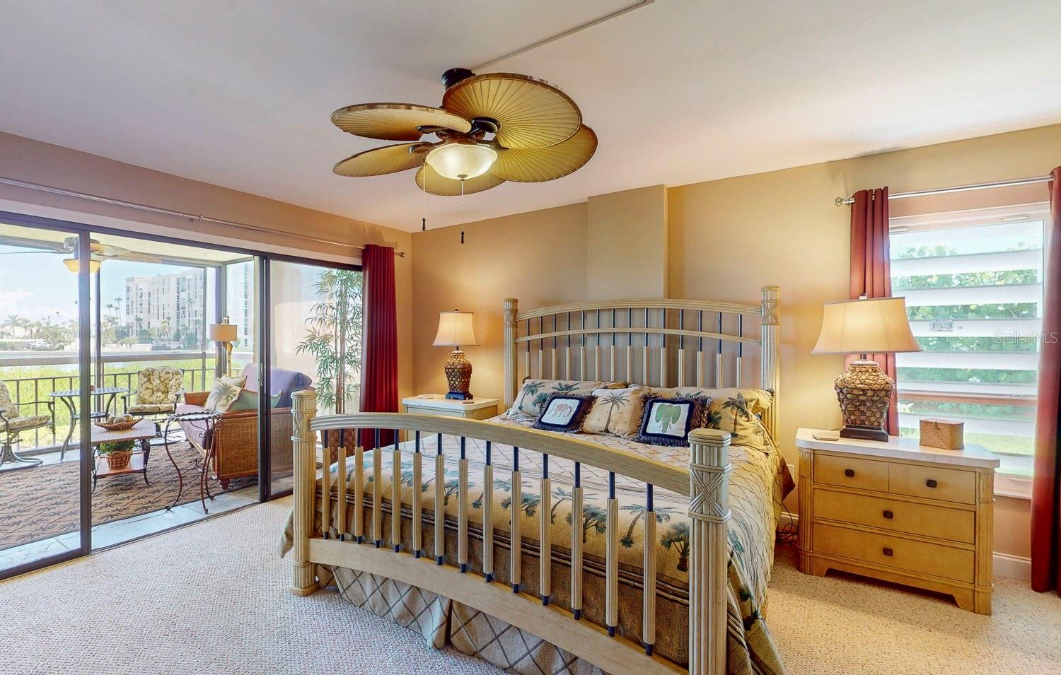 Large Owner Suite with views of water and landscaping.