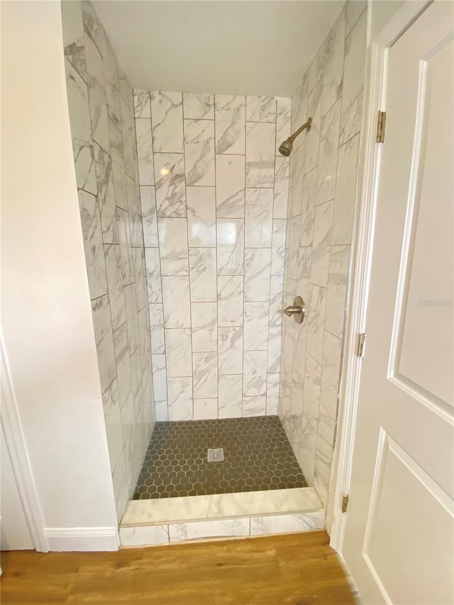 Beautiful shower in primary bathroom