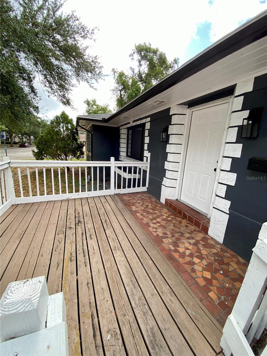 Incredible front porch with room for entertaining or just hanging out with friends