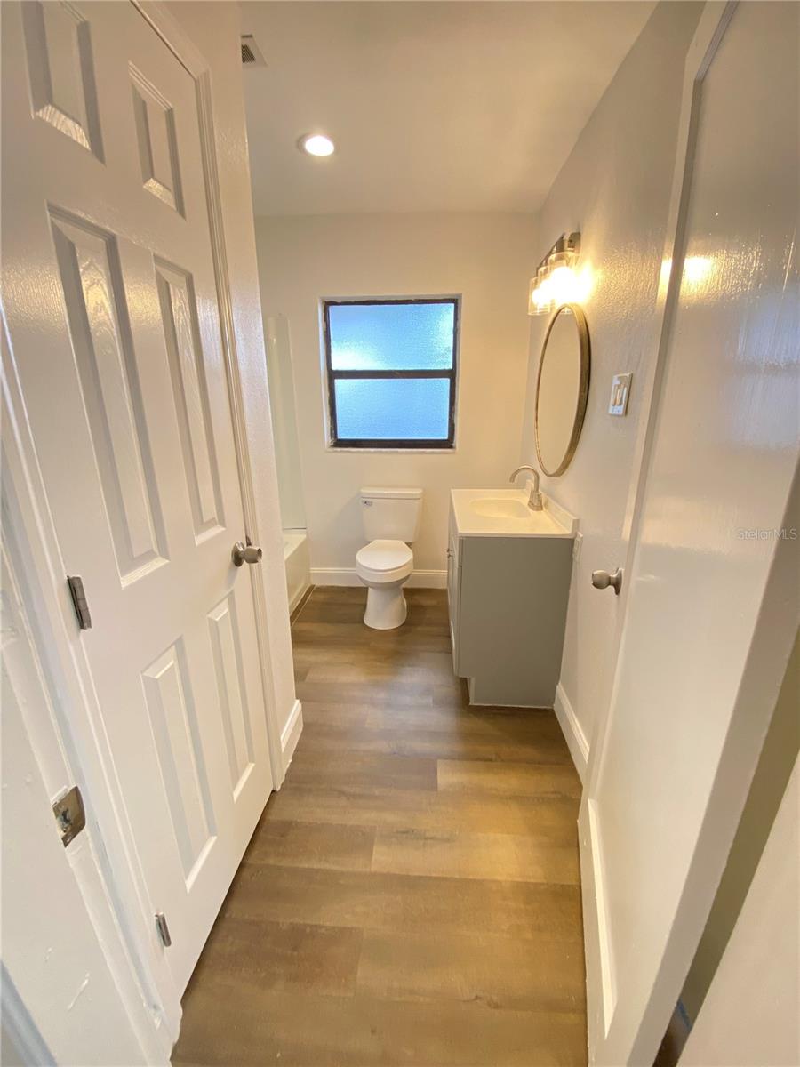 Primary bathroom view from second access door from second bedroom