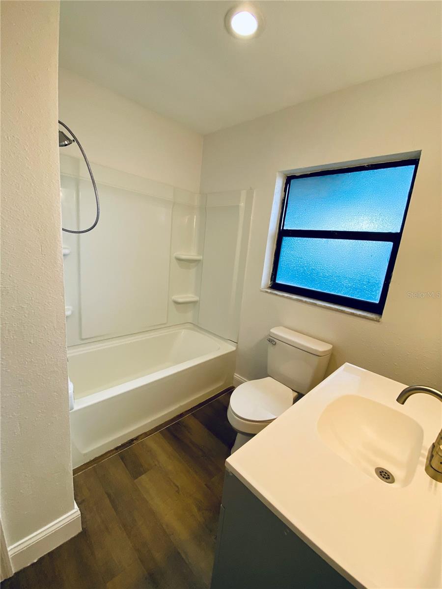 Second bathroom with tub and access door from hall or from 3rd bedroom on-suite