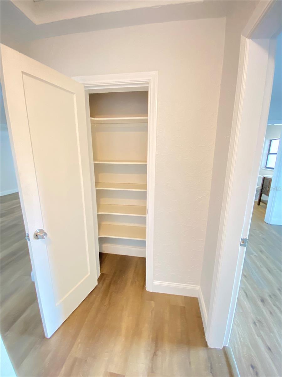 Closet for third bedroom in hall