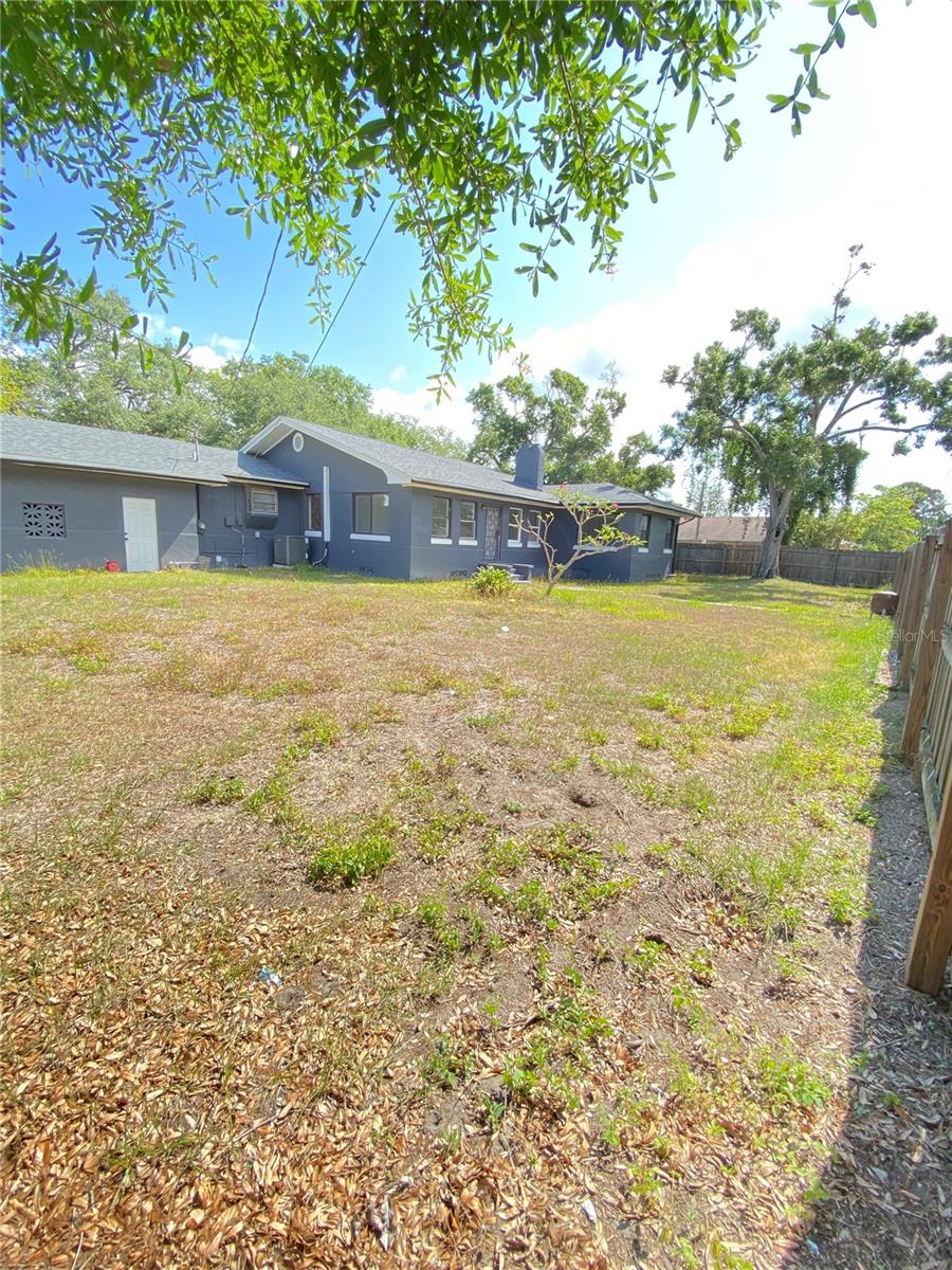 Rear corner view toward home from right side of backyard