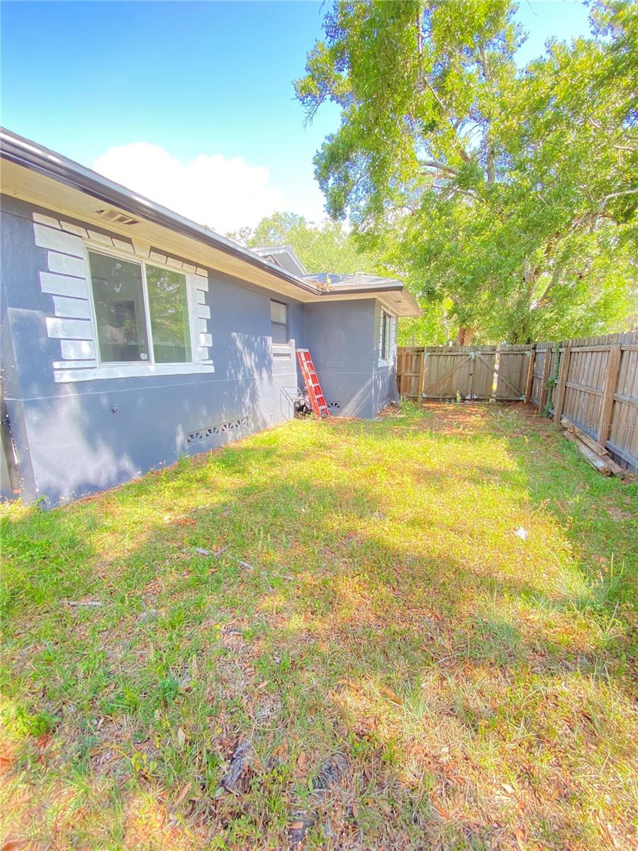 Left side of backyard view from inside