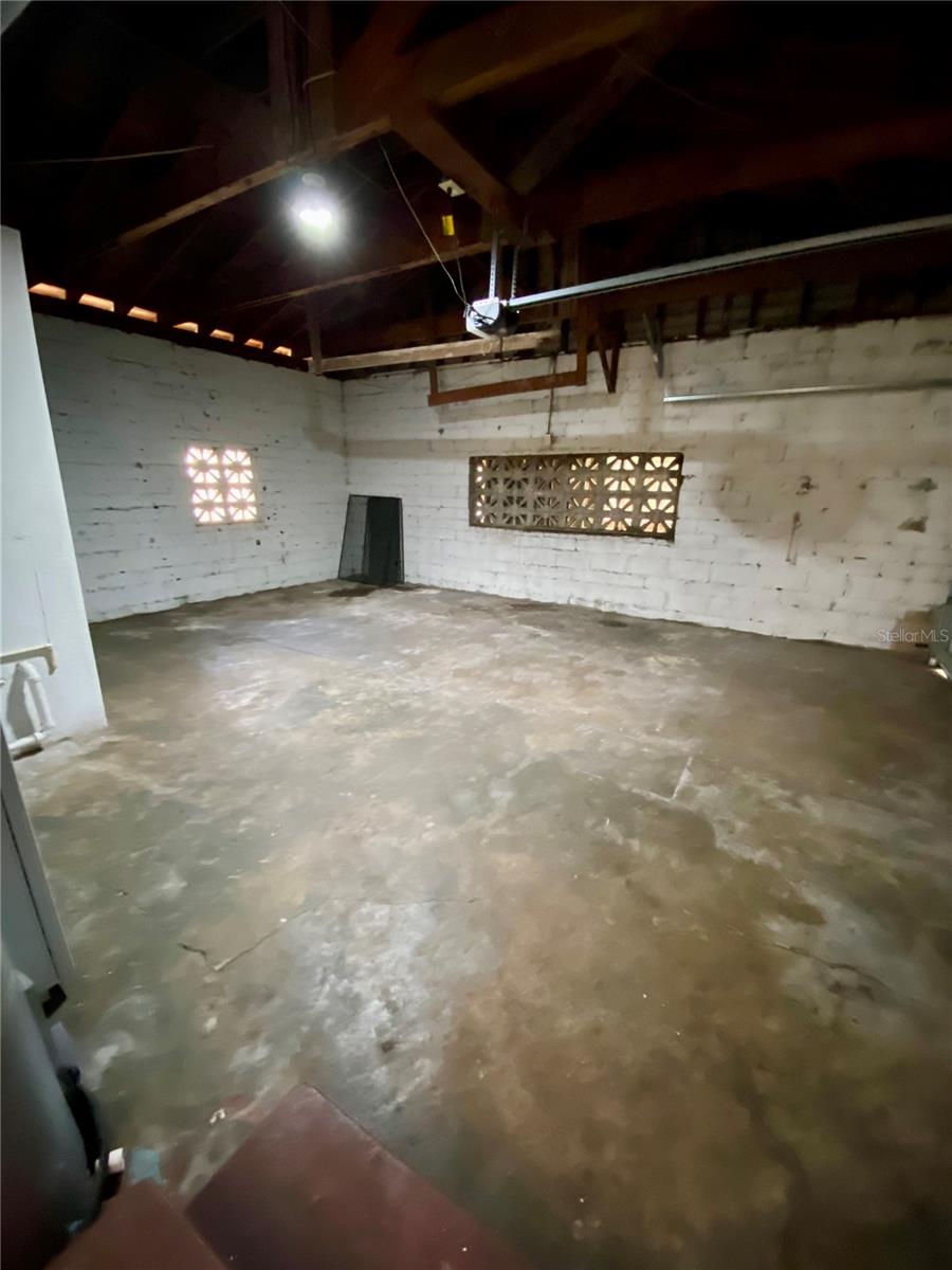 Looking into garage from kitchen nook exit door