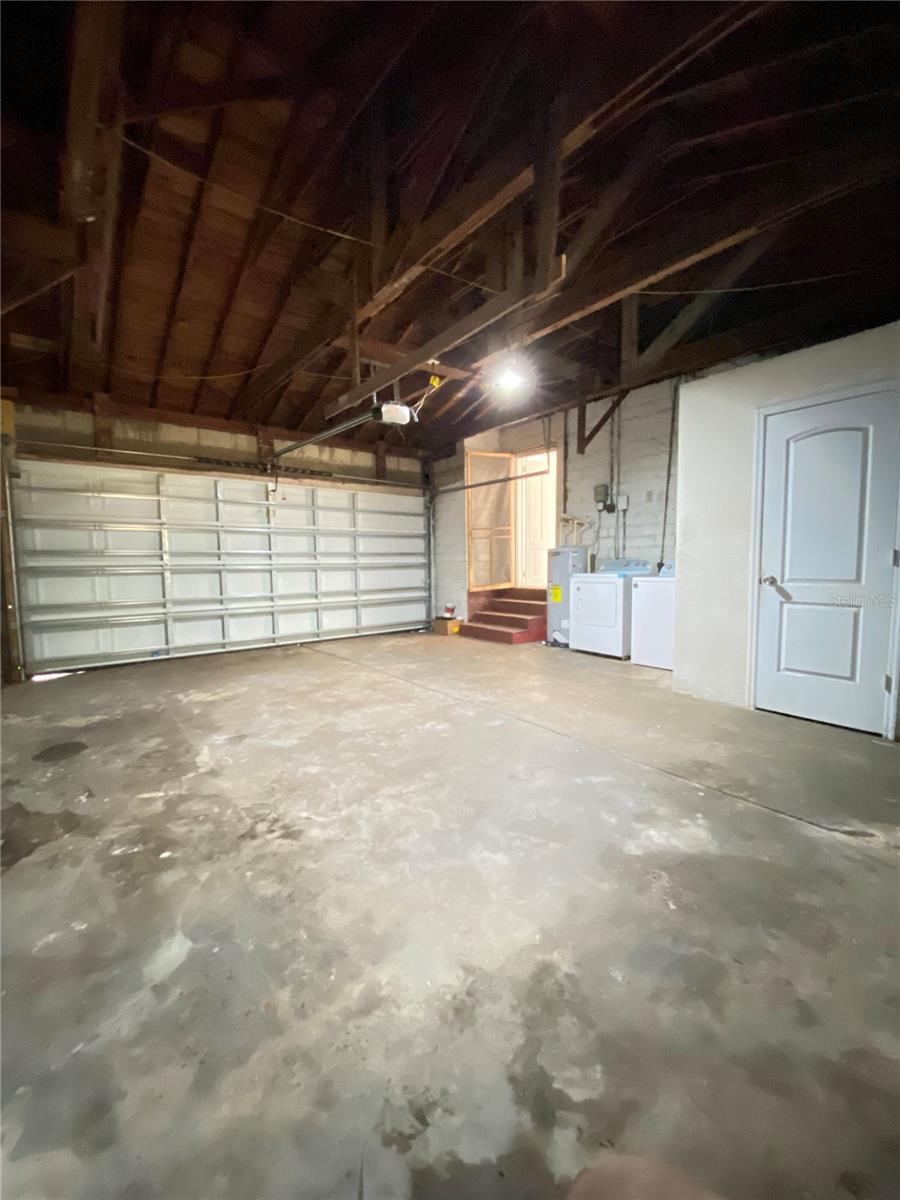 Looking towards entrance to kitchen nook from back of garage