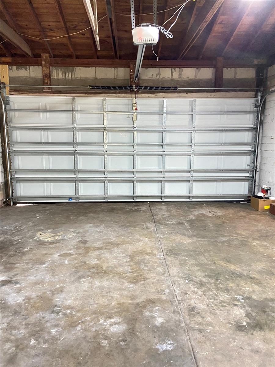 Newer garage door for the two-car garage