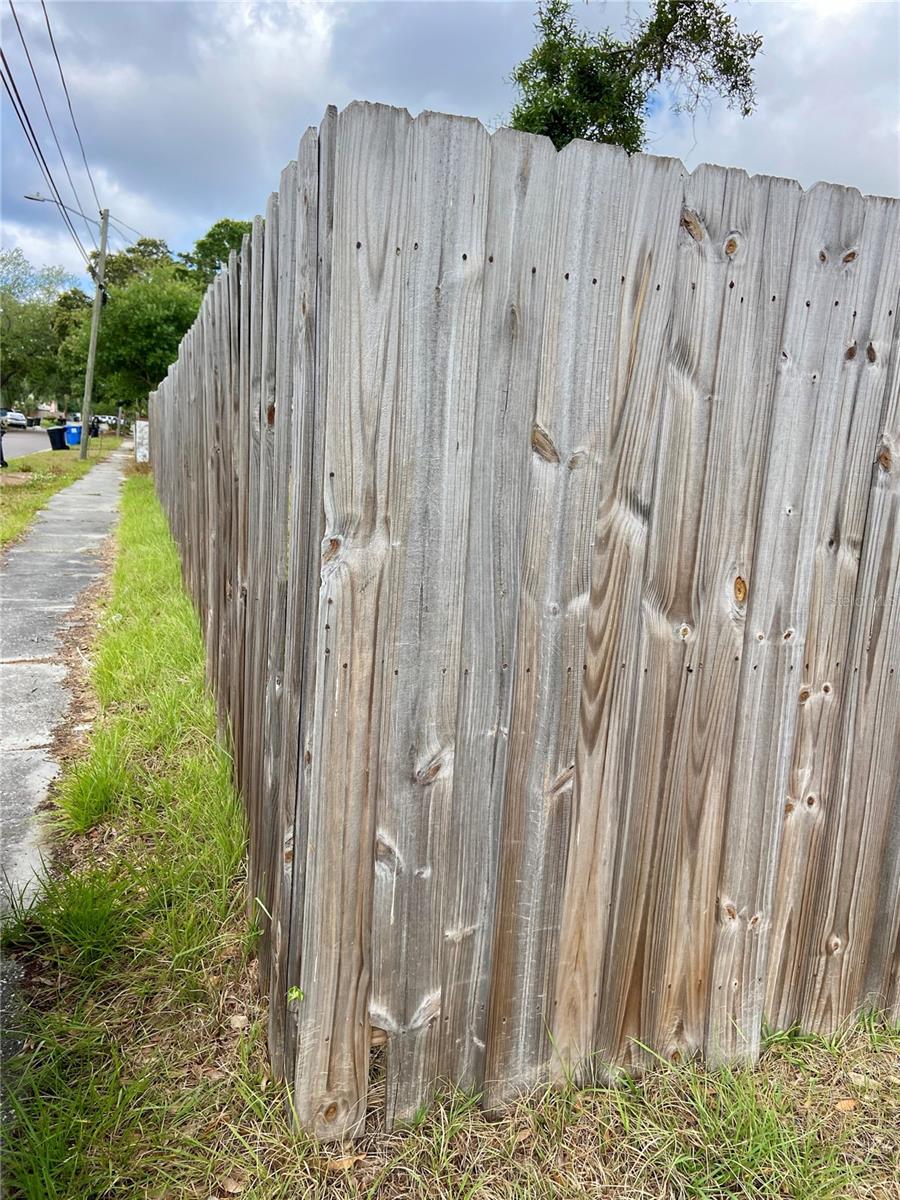 Corner fence view to back side of lot