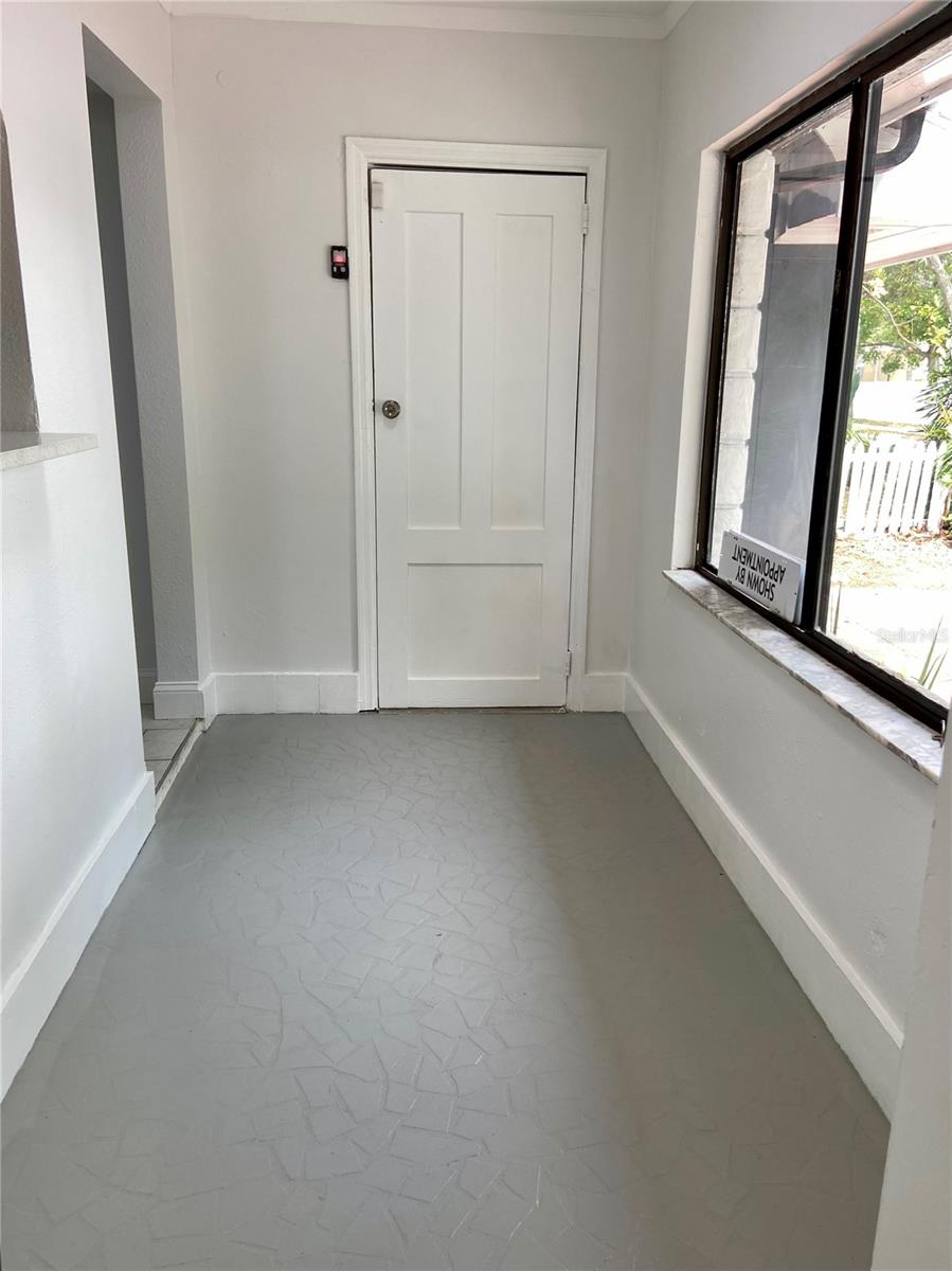 Kitchen nook with access door to the garage