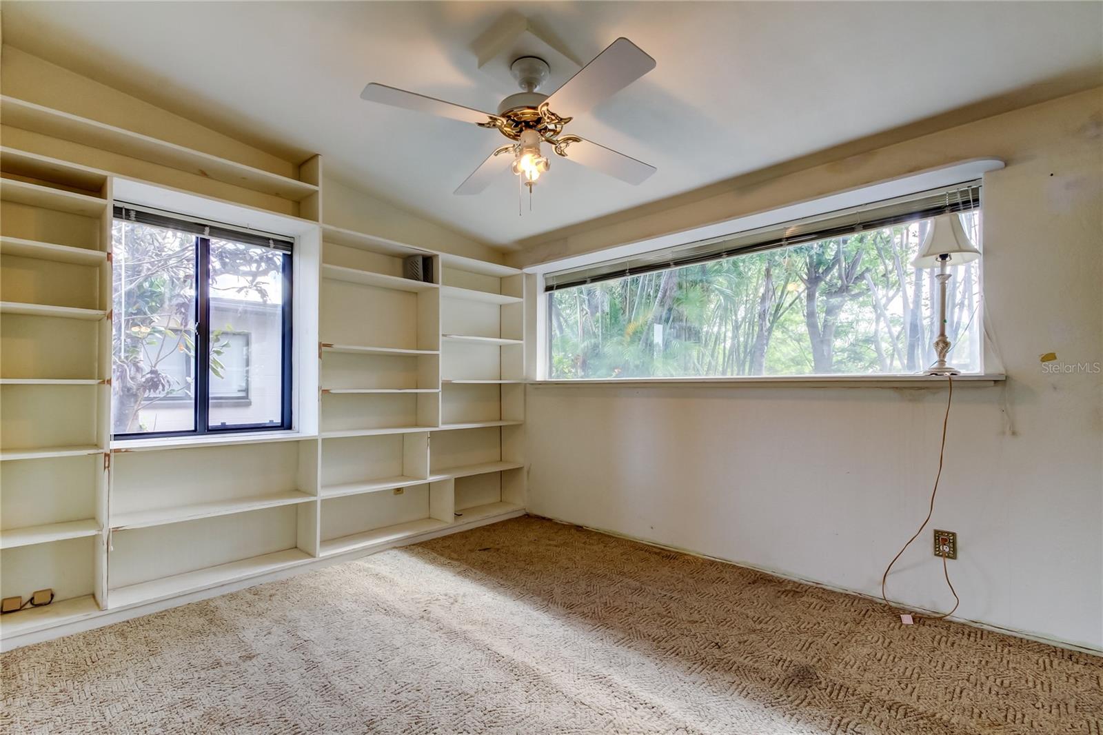 2nd bedroom with shelves downstairs