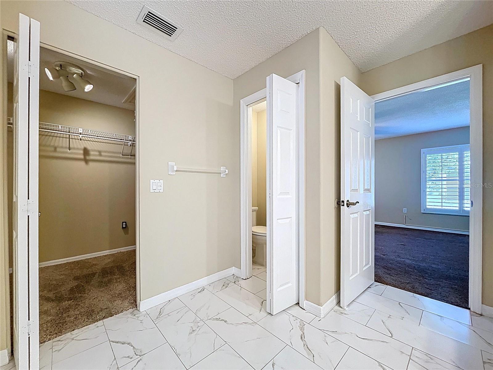 Private commode room and closet