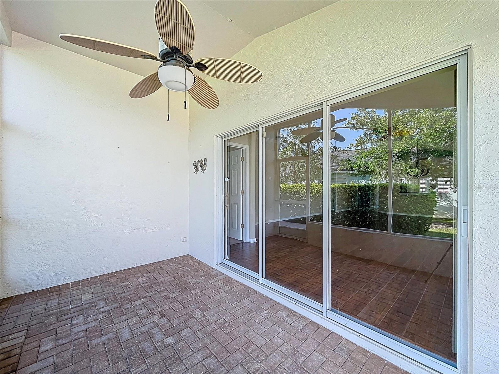 Sliding doors to brick paved lanai