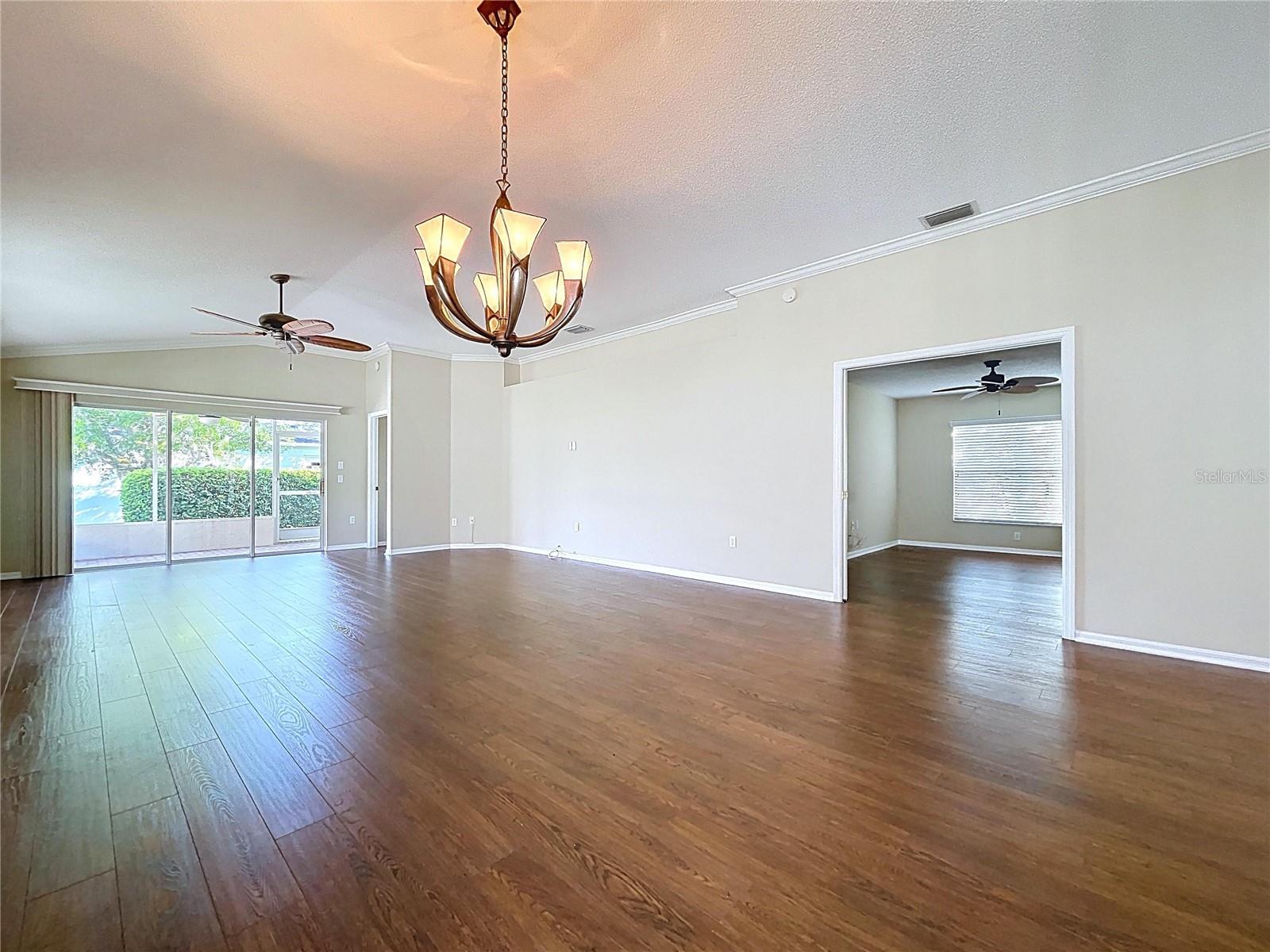 Open floor plan with access to den/office