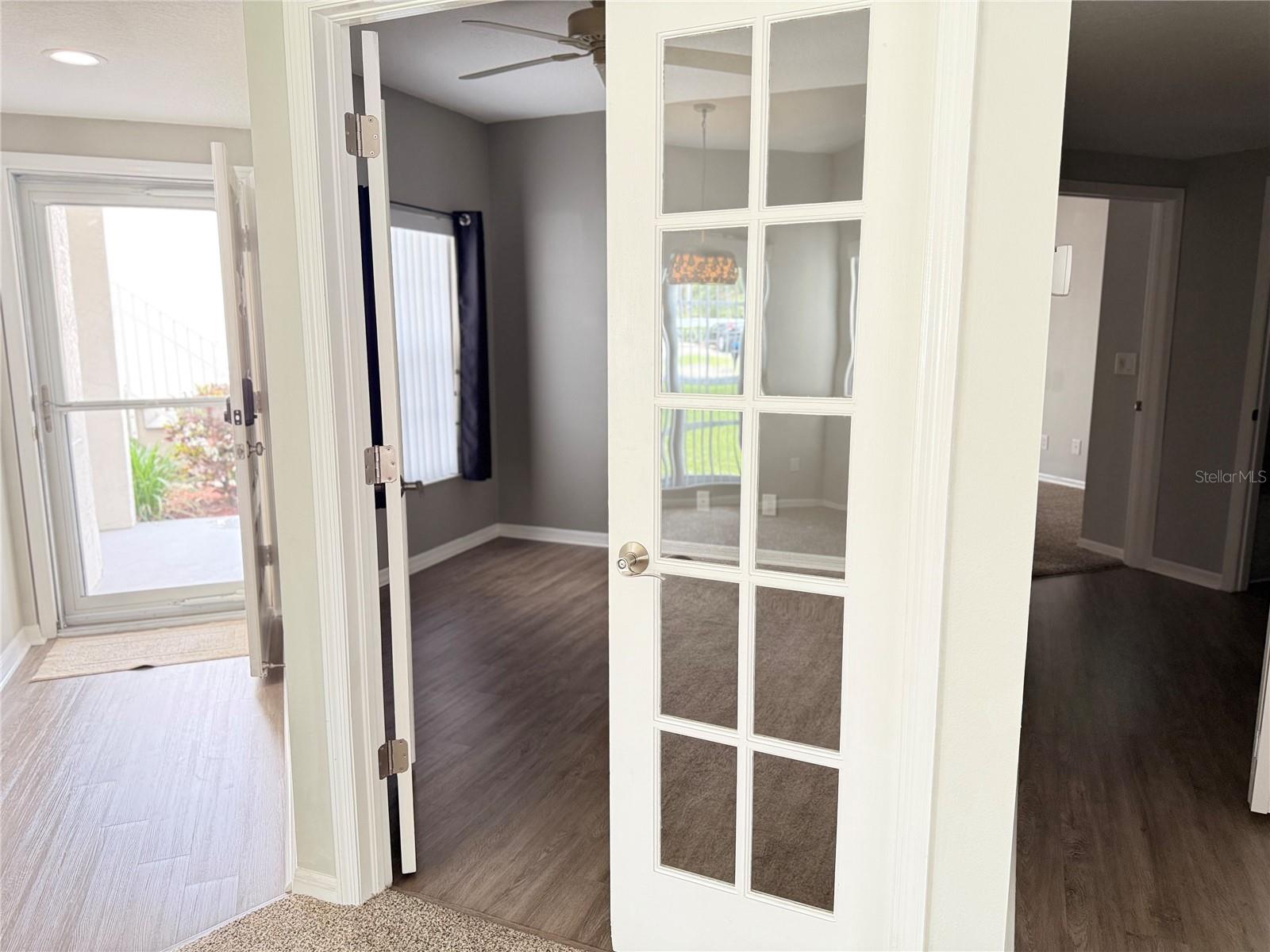 French doors to 2nd bedroom or study