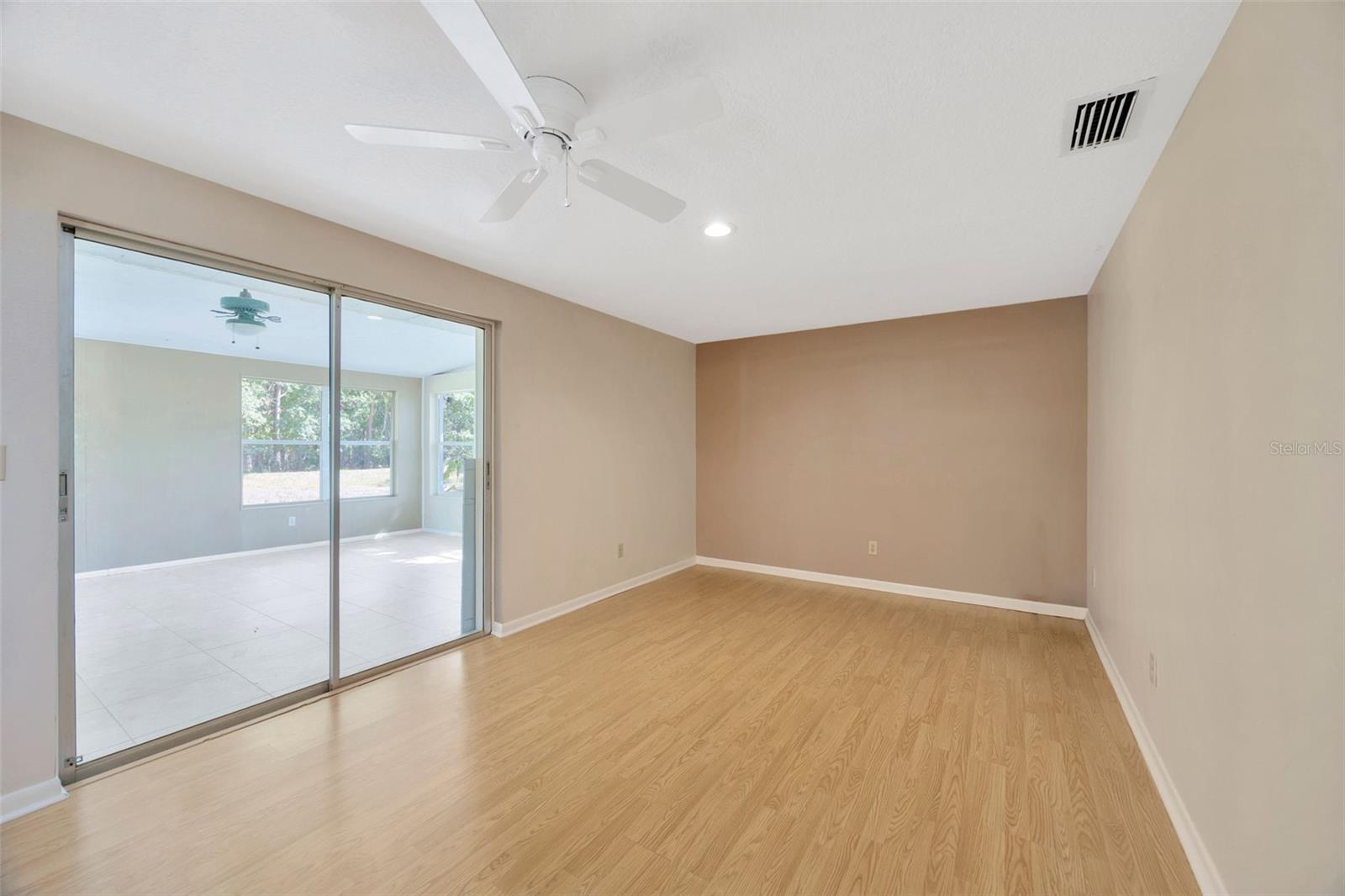 Sunken living room and slider to Florida room