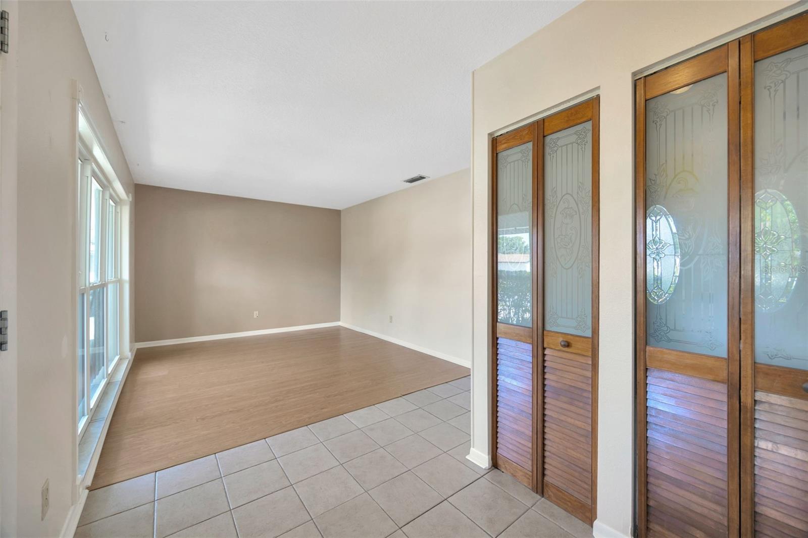Foyer, coat closet, living room