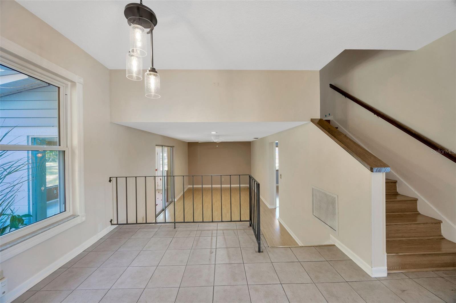 Dining room and stairs from kitchen