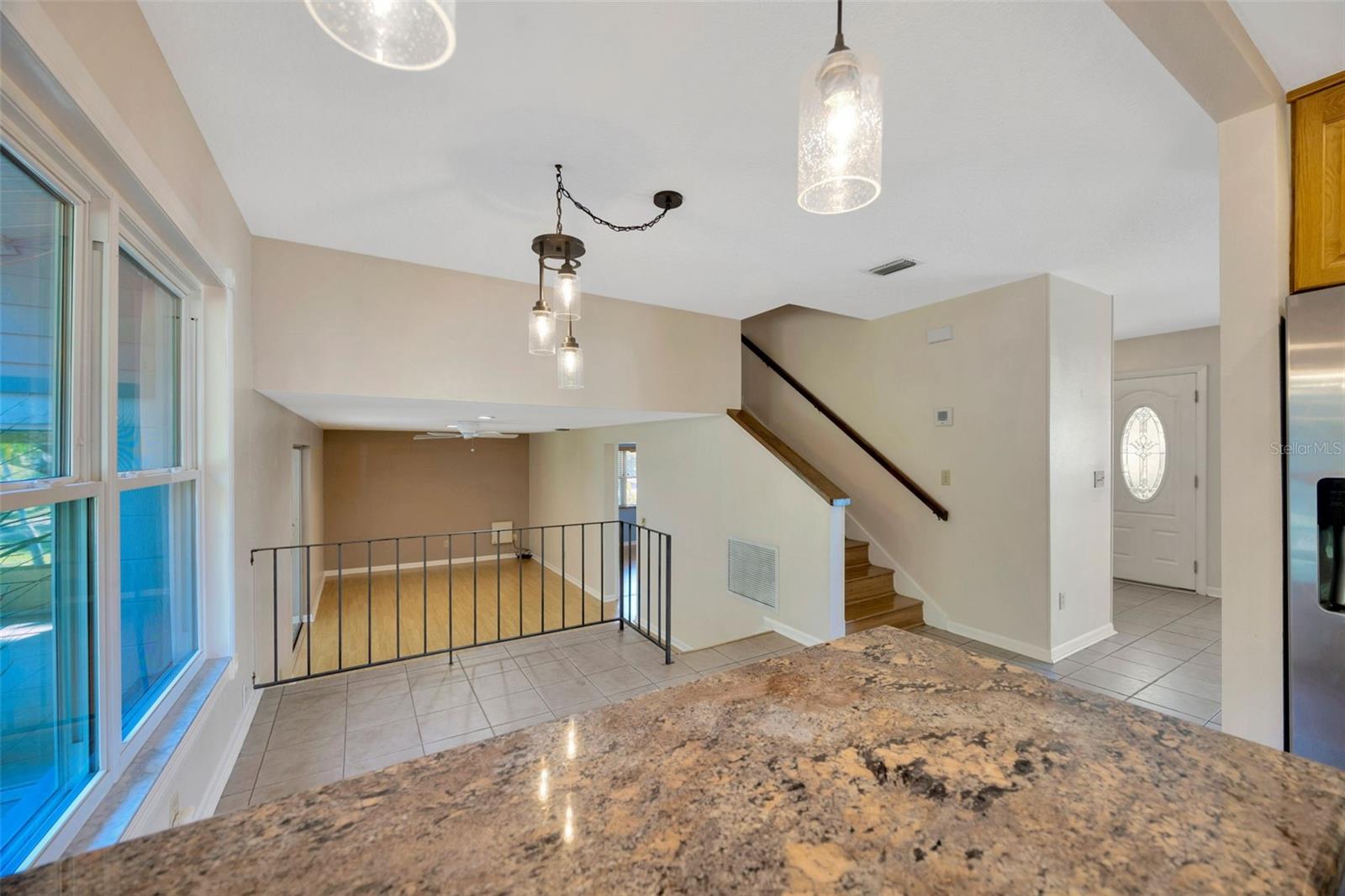View of sunken living room from kitchen