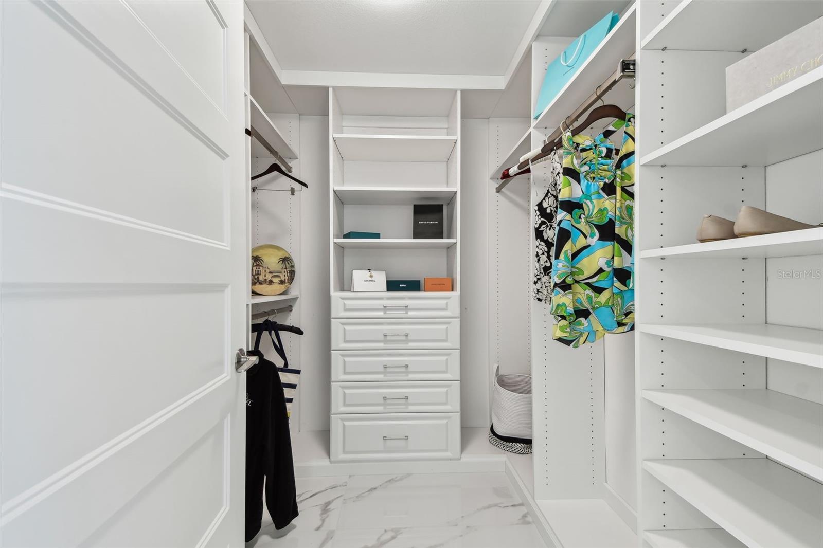 Primary Bedroom Walk In Closet (1 of 2)