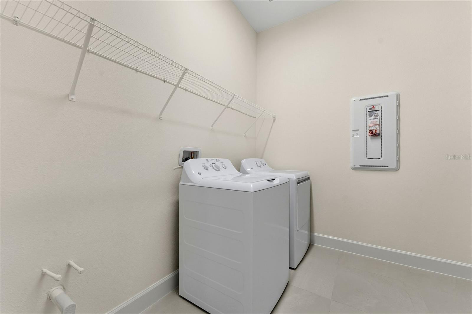 Spacious Laundry Room With Space For a 2nd Refrigerator & Pre plumbed For Laundry Sink