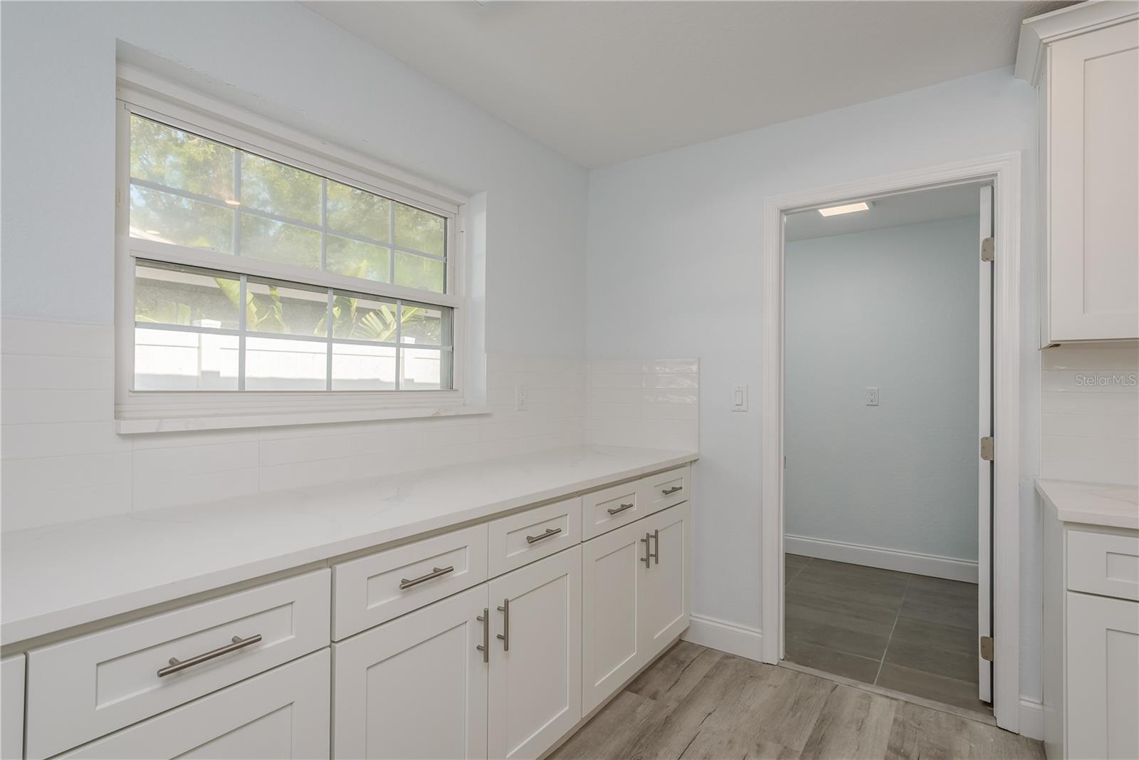 Laundry room off of kitchen