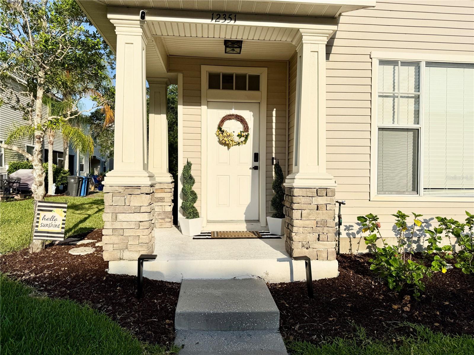 Front entrance with motion activated light and path lights