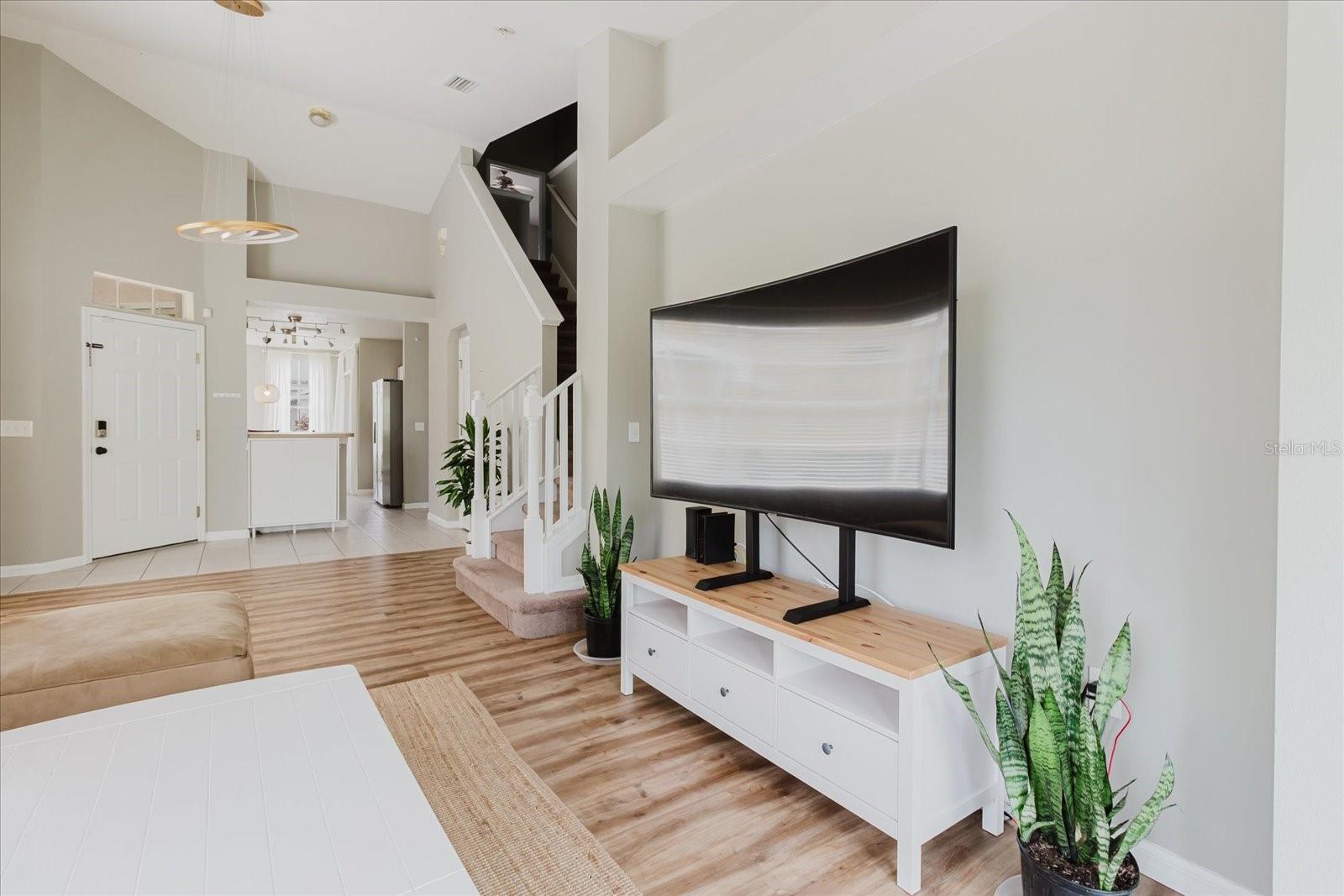 Open Concept Main Living Area With HIGH CEILINGS and Luxury Vinyl Floors