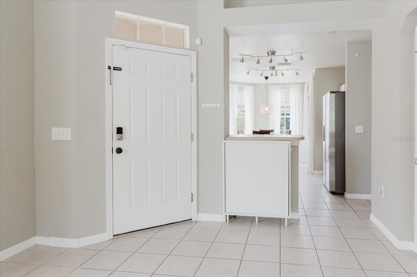 Foyer With Tile Floors